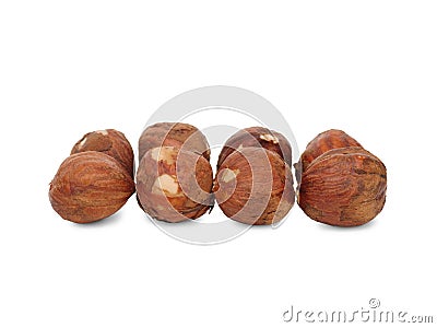 A few kernel hazelnuts in the shell are laid out exactly in a couple of rows. Isolated on white. Stock Photo