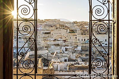 Fez medina seen through decorated in arabic style window, Morocco, North africa Editorial Stock Photo