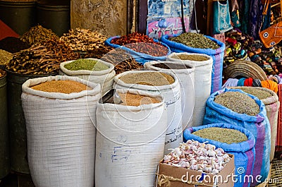 FEZ, MOROCCO. MAY 31, 2012: Spices and herbs for sale in old shop inside Medina of Fez Editorial Stock Photo