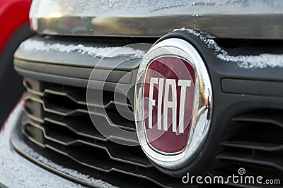 Fiat company logo on car in front of dealership on January 20, 2017 in Prague, Czech republic Editorial Stock Photo