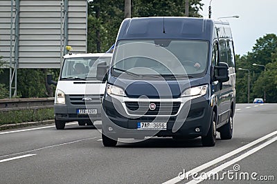 Fiat Ducato delivery van on 4-lane road with slight motion blur effect Editorial Stock Photo