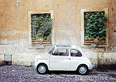 Fiat 500 parked in Rome, Italy Stock Photo