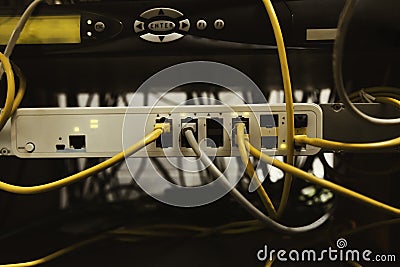 Network switch and UTP ethernet cables close-up in server room Stock Photo