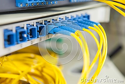 Optical network cables and servers Stock Photo