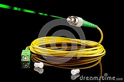 Fiber optics path cord on the black background Stock Photo