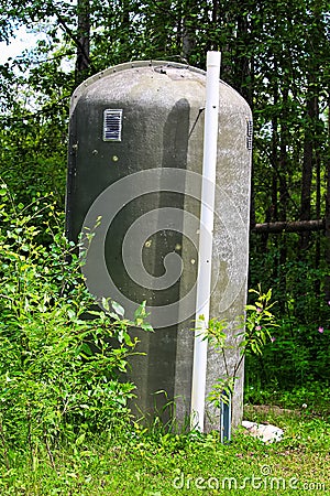 An fiberglass outhouse in a rustic campground Stock Photo