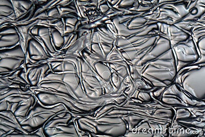 Fibers of Cellulose acetate under the microscope. Stock Photo