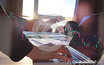 Fibonacci business graph concept, double exposure business person using laptop and stock graph chart Stock Photo