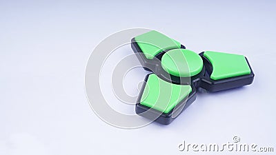 Fidget finger spinner stress, anxiety relief toy on white background. Stock Photo