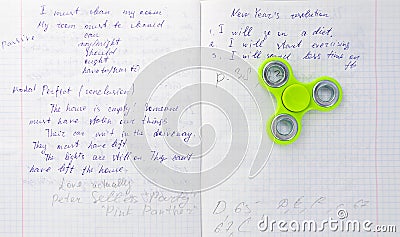 Fidget spinner stress relieving toy on notebook background Stock Photo