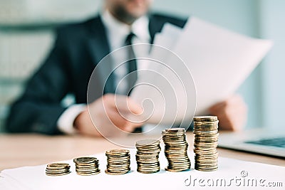 Fiduciary concept, business person with papers and financial funds in office Stock Photo