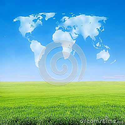 Field of grass with world shaped clouds Stock Photo