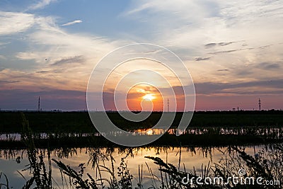 Field, river and beautiful sky Stock Photo