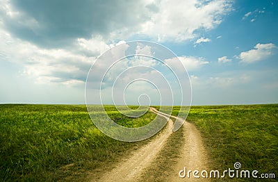 Field winding road through Stock Photo