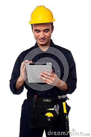 Field worker accessing touch pad Stock Photo