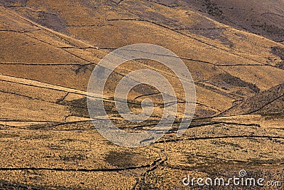 Fields and inca walls at the foot of Tunupa Stock Photo