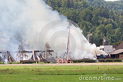 Fierman extinguish fire Stock Photo