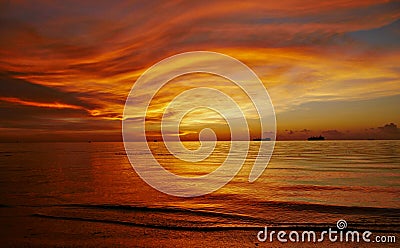 Fiery sunset streaks, Saipan Stock Photo