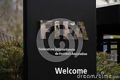 FIFA signpost at the entry for visitors, welcoming them to the headquarters in Zurich. Editorial Stock Photo