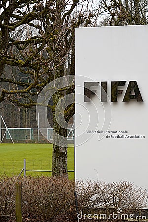 FIFA signpost at the entry for visitors, welcoming them to the headquarters in Zurich. Editorial Stock Photo