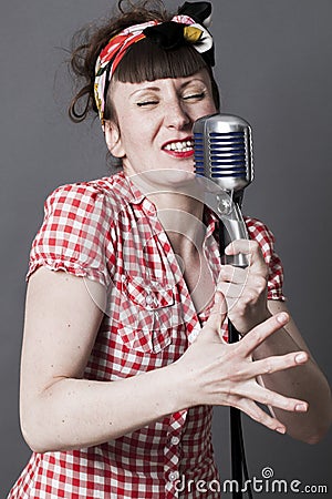 Fifties singer in studio for young woman with retro style Stock Photo