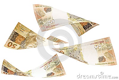 Fifty reais banknotes from Brazil falling on isolated white background. Concept of falling money, devaluation of the real or Stock Photo