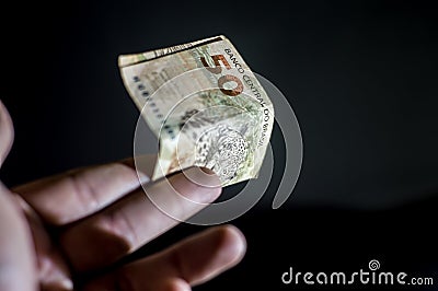 fifty reais bill, 50 reais, brl brazilian money, black background and copy space Stock Photo