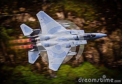 Fighter jet in full reheat afterburners Stock Photo
