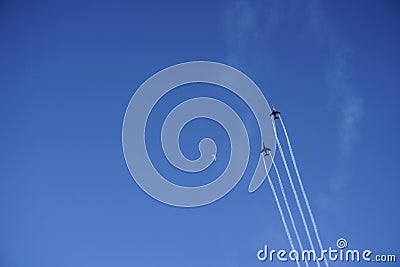 Fighter jets on blue sky with moon Stock Photo