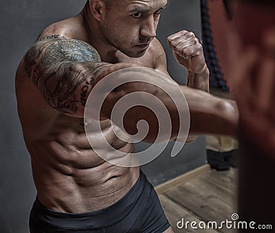 Fighter mixed martial arts training in the gym Stock Photo