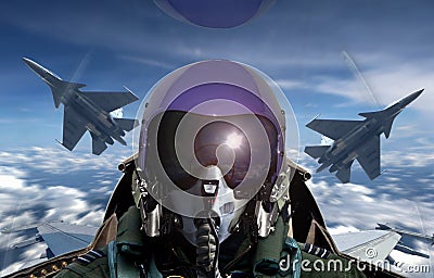 Fighter pilot cockpit view during sunrise Stock Photo