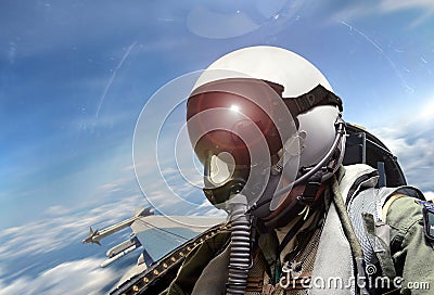 Fighter pilot cockpit view at sunrise Stock Photo