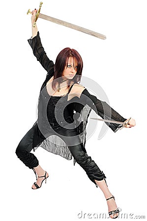 Fighting attractive assassin woman Stock Photo