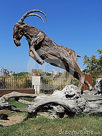 Fighting ibex, driftwood art decoration, Antalya Editorial Stock Photo