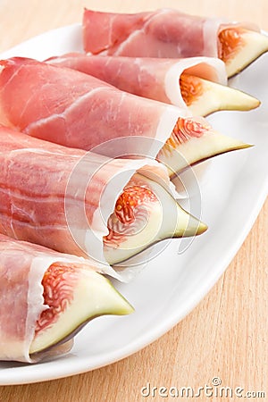 Figs in Prosciutto Italian cured ham Stock Photo