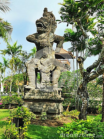 A figure of a Balinese Hindu guardian on a street on Bali Island in Indonesia Stock Photo