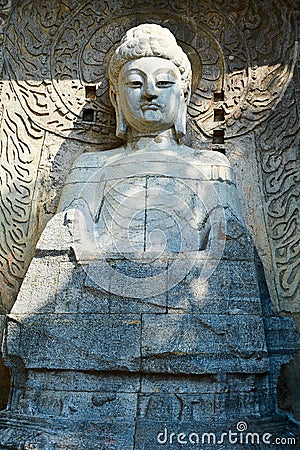 The figure of Buddha of Longmen Grottoes Stock Photo