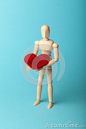 Figure of people with red heart. Blood donor. Medical donation and blood transfusion Stock Photo