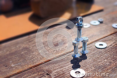 Figure of small robot assembled from bolts and nuts Stock Photo