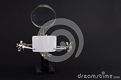 Figure of steel man with blank piece of paper - copy space Stock Photo