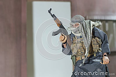 Taliban and weapon Miniature realistic toys man soldier figure Stock Photo