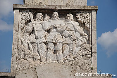 Figures in bas-relief of the obelisk, Alba Julia Stock Photo