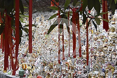 Figures of gods near the temple in Asia Editorial Stock Photo