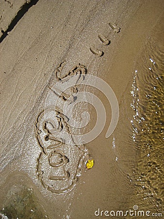 Figures love on sand Stock Photo