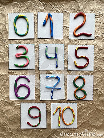 A set of bright, colored, plasticine numbers, handmade, made for children.Invoice in order Stock Photo