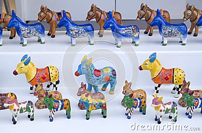 Figures of painted donkeys souvenirs from Santorini Editorial Stock Photo