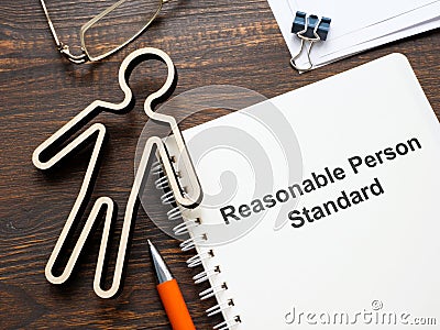 Figurine and document about Reasonable person standard. Stock Photo