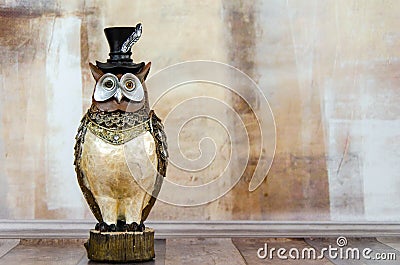 Figurine of an owl. solid business owl, symbol of wisdom, judicial law, training, jurisprudence Stock Photo