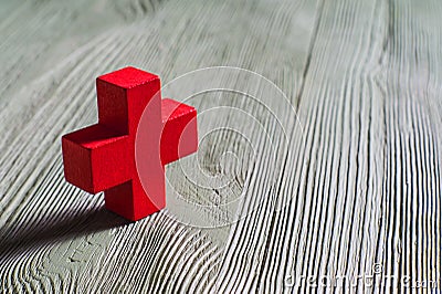 Figurine red wooden cross. Editorial Stock Photo