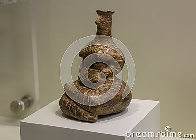 Figurine of a seated woman from the Neolithic period: Heraklion Archaeological Museum exhibit from 6000 BCE to the pre-Palatial Editorial Stock Photo